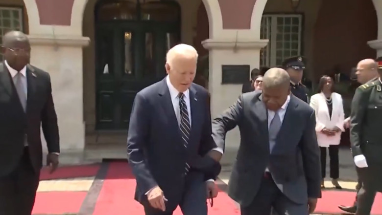 President of Angola Jerks Biden’s Arm to Guide Him During Arrival Ceremony (VIDEO)